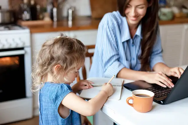 Mother and child applying for home financing online