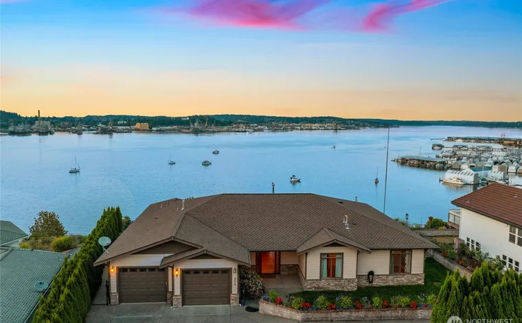 Home with brown roof at sunset